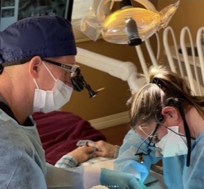 Dr. Erin Wolfson working on a dental patient